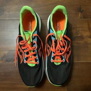 Saucony running shoes. Never been worn. Pristine condition.